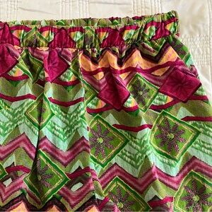 Shop Trendy beach shorts. Bright colorful design. Size large
